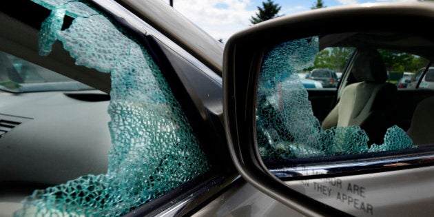 PORTLAND, ME - JUNE 10: A broken window on a car parked at the a park and ride on Marginal Way in Portland Wednesday, June 10, 2015. The car appears to have been broken into. There has been a string of break-ins in the last few days in the West Bayside and Parkside neighborhoods of Portland. (Photo by Shawn Patrick Ouellette/Portland Press Herald via Getty Images)