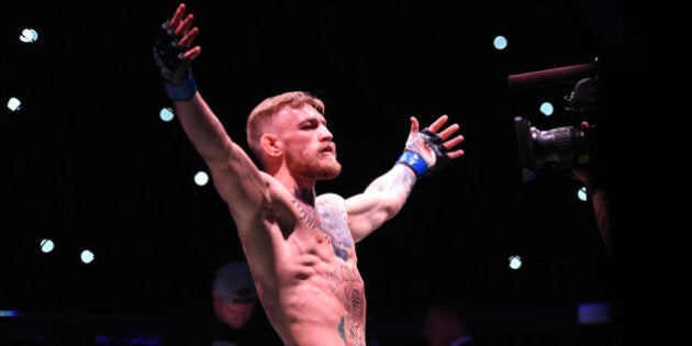 LAS VEGAS, NEVADA - DECEMBER 12: Conor McGregor of Ireland is introduced to the crowd before facing Jose Aldo of Brazil in their featherweight championship bout during the UFC 194 event inside MGM Grand Garden Arena on December 12, 2015 in Las Vegas, Nevada. (Photo by Jeff Bottari/Zuffa LLC/Zuffa LLC via Getty Images)