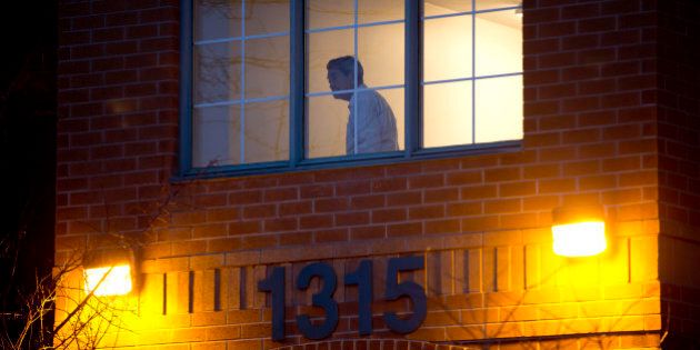 TORONTO, ON- FEBRUARY 5:A man looks out of a hallway window after Friday's tragic fire on the 5th floor of the Toronto Community Housing building at 1315 Neilson Road. (Lucas Oleniuk/Toronto Star via Getty Images)