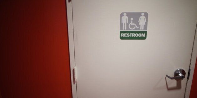 A gender neutral bathroom is seen at a restaurant in Washington, DC, on May 5, 2016.A heated national debate over access to bathrooms by transgenders is sweeping the United States, with schools and businesses grappling with the issue that has become a hot topic in the presidential campaign. The so-called 'bathroom battle' erupted after North Carolina in March became the first US state to require transgender people to use restrooms in public buildings that match the sex on their birth certificate, rather than the gender by which they identify.Mississippi followed suit in April and a number of other conservative states and cities are mulling or have passed similar legislation. / AFP / MANDEL NGAN (Photo credit should read MANDEL NGAN/AFP/Getty Images)