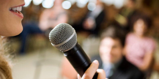 Woman Speaking at Conference