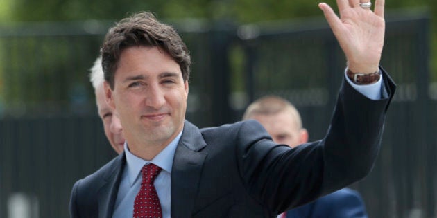 Canadian Prime Minister Justin Trudeau arrives at the NATO summit in Warsaw, Poland, Friday, July 8, 2016. Starting Friday, US President Barack Obama and leaders of the 27 other NATO countries will take decisions in Warsaw on how to deal with a resurgent Russia, violent extremist organizations like Islamic State, attacks in cyberspace and other menaces to allies' security during a summit described by many observers as NATO's most crucial meeting since the 1989 fall of the Berlin Wall.(AP Photo/Markus Schreiber)