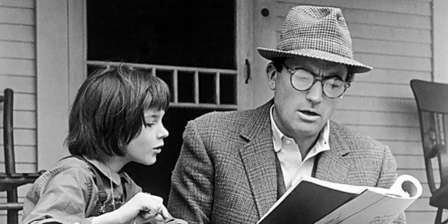 ... Mary Badham and Gregory Peck work on their lines.