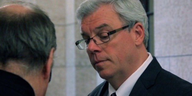 While walking through the Manitoba Legislative Assembly, I walked passed Premier Greg Selinger, who was in the midst of a media scrum with a group of local reporters.