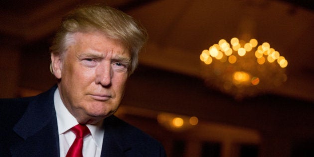 Republican presidential candidate Donald Trump poses for a portrait after an interview with The Associated Press in Sterling, Va., Wednesday, Dec. 2, 2015. Trump says that if heâs elected president, heâll know within six months whether he can achieve an elusive peace accord between Israelis and Palestinians, one of the worldâs most vexing challenges. But the Republican presidential candidate says he has doubts about each sideâs commitment to the peace process. (AP Photo/Andrew Harnik)