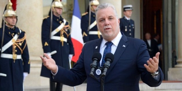 Prime Minister of Quebec Philippe Couillard makes a statement following his meeting with French president at the Elysee Palace, on December 7, 2015, in Paris. / AFP / BERTRAND GUAY (Photo credit should read BERTRAND GUAY/AFP/Getty Images)