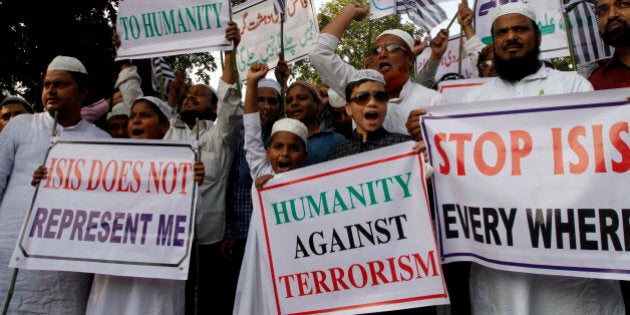 Indian Muslims shout slogans during a protest against ISIS, an Islamic State group, and the Nov. 13 attacks in Paris, in the eastern Indian city of Bhubaneswar, Friday, Nov. 20, 2015. Multiple attacks across Paris last Friday night left more than one hundred dead and many more injured. (AP Photo/Biswaranjan Rout)