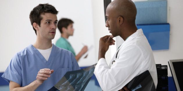 Doctors discussing x-rays