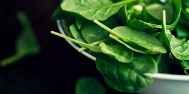 Spinach salad in bowl.