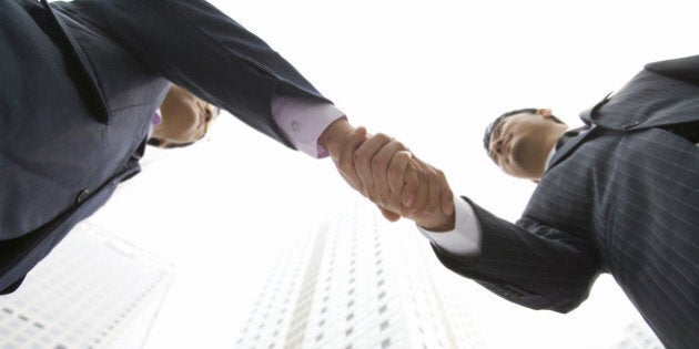 Two Businessmen Shaking Hands, China, Beijing