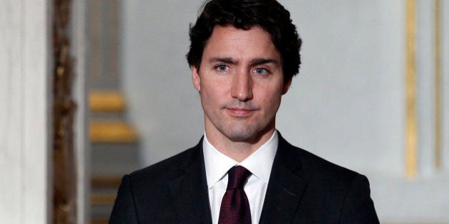 PARIS, FRANCE - NOVEMBER 29: Canadian Prime minister, Justin Trudeau makes a statement during a press conference next to French President Francois Hollande at the Elysee Presidential Palace on November 29, 2015 in Paris, France. France will host climate change conference COP21 in Paris from November 30 to December 11, 2015. (Photo by Chesnot/Getty Images)