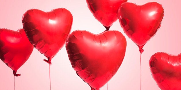 Studio shot of red heart shaped balloons