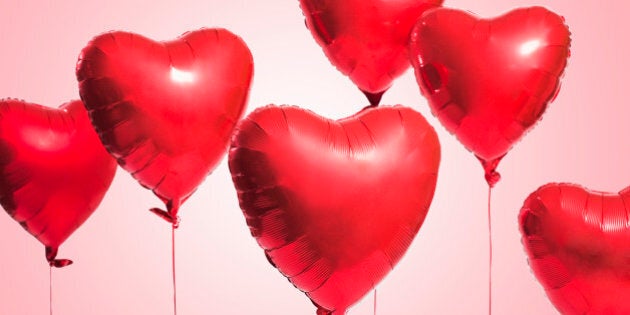 Studio shot of red heart shaped balloons