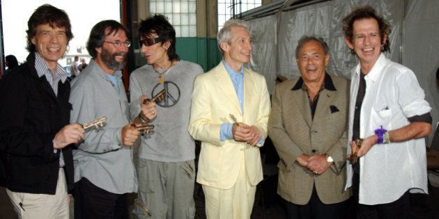 The Rolling Stones' Mick Jagger, Ronnie Wood, Charlie Watts and Keith Richards along with concert promoter Michael Cohl (2nd from left) receive Keys to the City from the Mayor of Toronto, Mel Lastman (2nd from right) (Photo by KMazur/WireImage for Molson Sports and Entertainment)