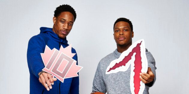 TORONTO, ON - FEBRUARY 11: DeMar DeRozan and Kyle Lowry of the Toronto Raptors poses with their twitter emojis for a portrait on February 11, 2016 at the Sheraton Centre in Toronto, Ontario Canada. NOTE TO USER: User expressly acknowledges and agrees that, by downloading and/or using this photograph, user is consenting to the terms and conditions of the Getty Images License Agreement. Mandatory Copyright Notice: Copyright 2016 NBAE (Photo by Jennifer Pottheiser/NBAE via Getty Images)