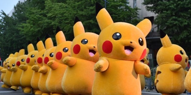 Costumed performers as Pikachu, the popular animation Pokemon series character, perform at the Yokohama Dance Parade in Yokohama on August 2, 2015. The dance began on August 1 and will run for 65 days throughout the city, with more than 200 dance programmes. AFP PHOTO / KAZUHIRO NOGI (Photo credit should read KAZUHIRO NOGI/AFP/Getty Images)