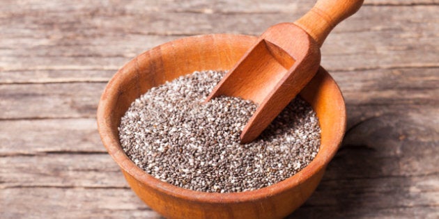 chia seeds close up in a wooden bowl