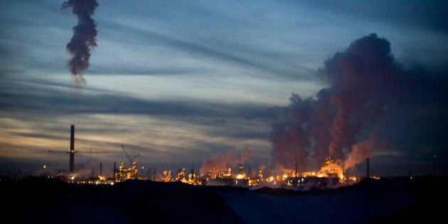 FORT MCMURRAY, ALBERTA, CANADA - NOVEMBER 2008: The oil sand industry never stops, continuing day and night. Here, the Syncrude Canada Ltd refinery separates the oil from the sands. Tar sands, or oil sands, are very dense and contain a form of petroleum The world's largest reserves of tar sands in Canada and Venezuela. Tar sands could equate to approximately two thirds of the total global petroleum resource. Until recently it was financially not viable to extract the oil from the sands, but new technology and rising oil prices have now made it viable. (Photo by Veronqiue de Viguerie/Getty Images)