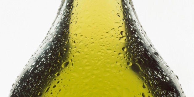 close-up of olive oil bottle