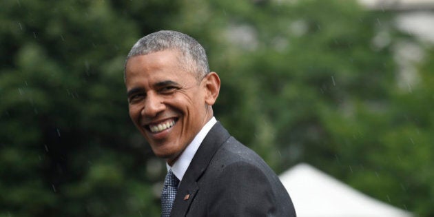 President Barack Obama walks on the South Lawn of the White House in Washington, Tuesday, June 21, 2016, after returning from Walter Reed National Military Medical Center where he met with troops. (AP Photo/Susan Walsh)