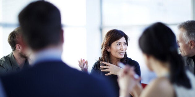 Business people talking in meeting