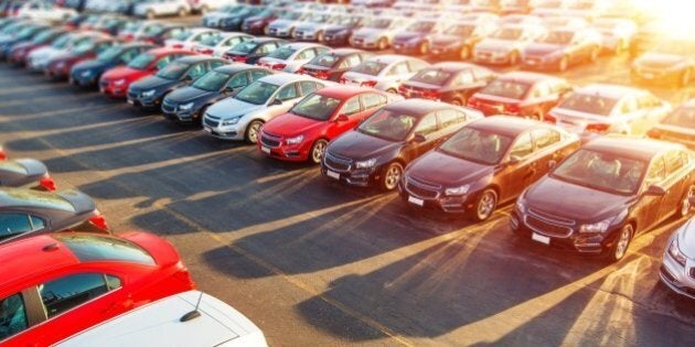 Dealer New Cars Stock. Colorful Brand New Compact Vehicles For Sale Awaiting on the Dealer Parking Lot. Car Market Business Concept.