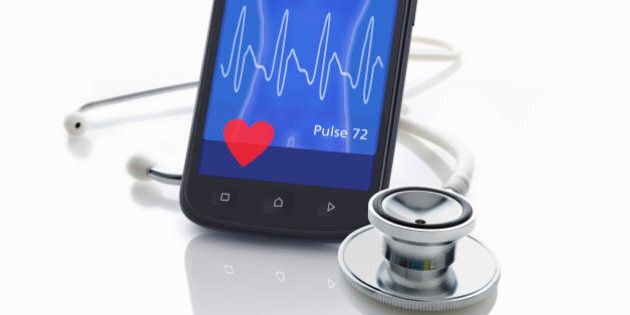 Mobile smart-phone as a medic monitor with a stethoscope. Graphics on the display are part of the image copyright.