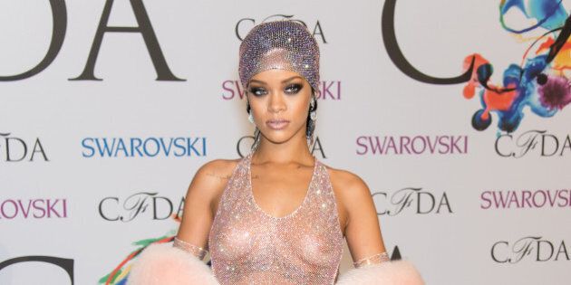 NEW YORK, NY - JUNE 02: (EDITORS NOTE: Image contains partial nudity.) Recipient of the 2014 CFDA Fashion Icon Award, Rihanna attends the 2014 CFDA fashion awards at Alice Tully Hall, Lincoln Center on June 2, 2014 in New York City. (Photo by Gilbert Carrasquillo/FilmMagic)
