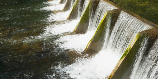 Water pouring over dam, Vancouver, British Columbia, Canada