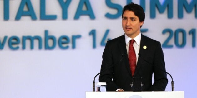 ANTALYA, TURKEY - NOVEMBER 15 : Prime Minister of Canada Justin Trudeau (C) gives a speech during the L20 / B20 joint Summit held prior to the G20 Leaders' Summit, in Antalya, Turkey on November 15, 2015. Antalya, top tourist attraction city in southern Turkey on the coast of the Mediterranean Sea, host the G20 Turkey Leaders Summit between November 15 and 16. (Photo by Ali Ihsan Ozturk/Anadolu Agency/Getty Images)