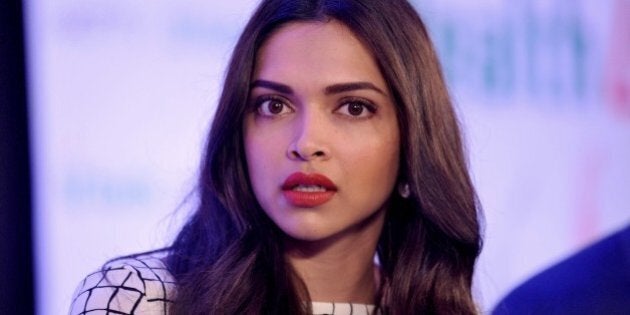 Indian Bollywood film actrss Deepika Padukone poses during the launch of the 'NDTV Fortis Health4U' nationwide Campaign in Mumbai on September 12, 2014. AFP PHOTO (Photo credit should read STR/AFP/Getty Images)