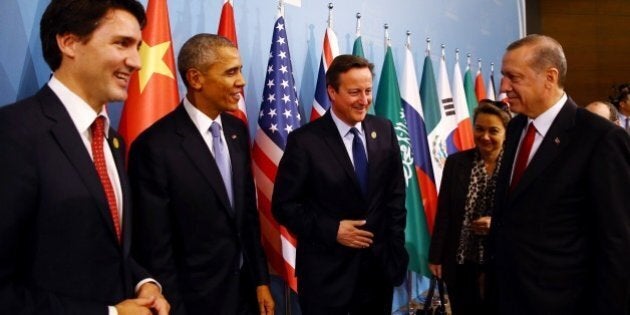 ANTALYA, TURKEY - NOVEMBER 15: Turkish President Recep Tayyip Erdogan (R), Canadian Prime Minister Justin Trudeau (L), US President Barack Obama (L-2) and British Prime Minister David Cameron (L-3) attend a working dinner on the 'Global Changes: Terrorim, Refugee Crisis' during the G20 Turkey Leaders Summit on November 15, 2015 in Antalya, Turkey. (Photo by Kayhan Ozer/Anadolu Agency/Getty Images)