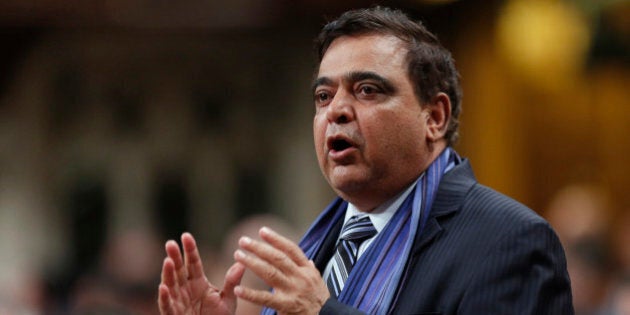 Conservative Member of Parliament Deepak Obhrai speaks during Question Period in the House of Commons on Parliament Hill in Ottawa April 2, 2014. REUTERS/Chris Wattie (CANADA - Tags: POLITICS)