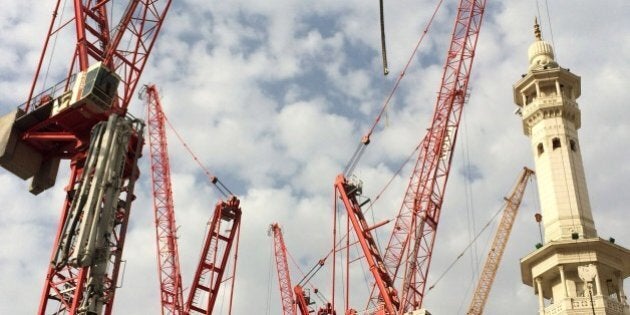 Construction cranes are seen in Saudi Arabia's holy Muslim city of Mecca on September 12, 2015, a day after a crane collapsed at the Grand Mosque. This year's Muslim Hajj pilgrimage will go ahead despite a crane collapse which killed more than 100 people at the Grand Mosque of Mecca, a Saudi official told AFP. AFP PHOTO / AHMED FARWAN (Photo credit should read AHMED FARWAN/AFP/Getty Images)