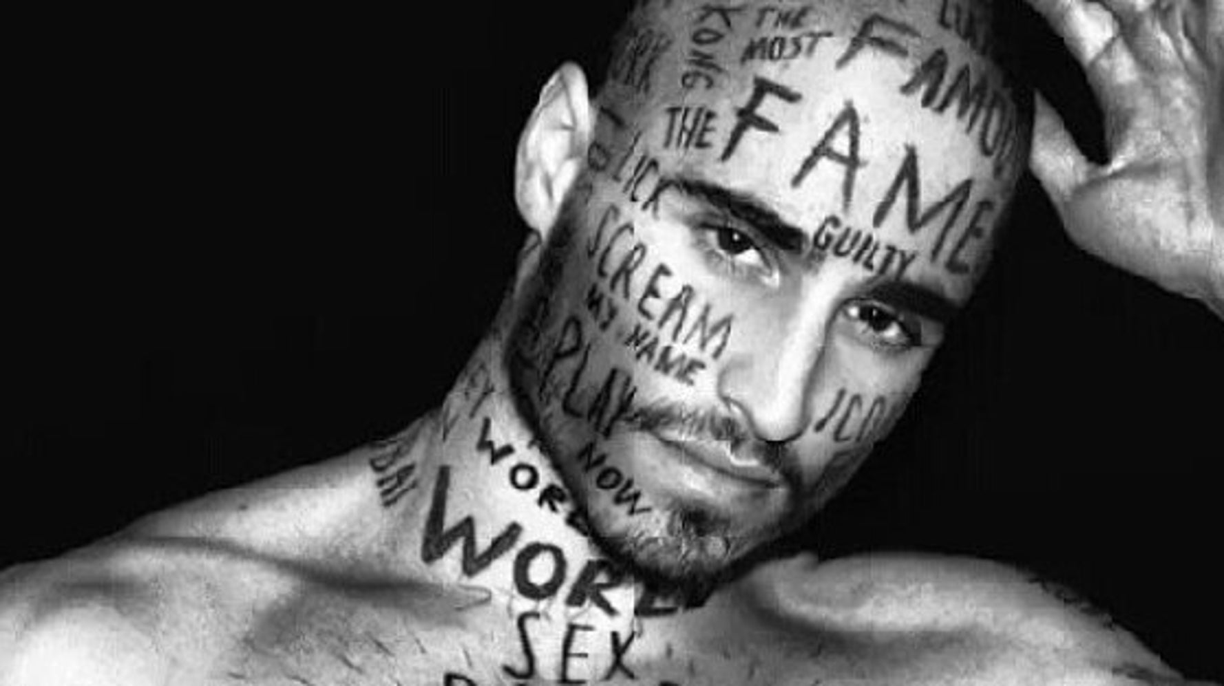 Model Vin Los with words tattooed on his FACE lands Garçon Model