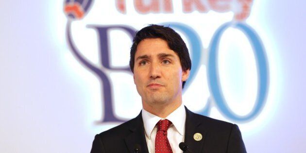 ANTALYA, TURKEY - NOVEMBER 15 : Prime Minister of Canada Justin Trudeau (C) gives a speech during the L20 / B20 joint Summit held prior to the G20 Leaders' Summit, in Antalya, Turkey on November 15, 2015. Antalya, top tourist attraction city in southern Turkey on the coast of the Mediterranean Sea, host the G20 Turkey Leaders Summit between November 15 and 16. (Photo by Ali Ihsan Ozturk/Anadolu Agency/Getty Images)