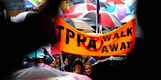 AUCKLAND, NEW ZEALAND - AUGUST 15: Anti TPPA protestors march down Queen Street on August 15, 2015 in Auckland, New Zealand. The Trans-Pacific Partnership Agreement (TPPA) is a proposed regional free trade deal between 12 countries in the Asia-Pacific region. (Photo by Phil Walter/Getty Images)