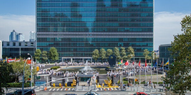 To mark the 70th birthday of the United Nations, UN staff form 'What R U Doing for Peace' at United Nations Headquarters, Sept 17, 2015, New York.