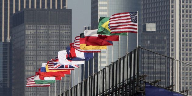 'Flags of various nations on grandstand fluttering in the wind, New York City.'
