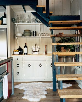 Ditch cabinets for open shelving to keep away that "claustrophobic" feeling.