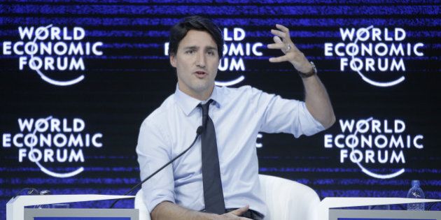 Justin Trudeau, Canada's prime minister, gestures as he speaks during a panel session at the World Economic Forum (WEF) in Davos, Switzerland, on Friday, Jan. 22, 2016. World leaders, influential executives, bankers and policy makers attend the 46th annual meeting of the World Economic Forum in Davos from Jan. 20 - 23. Photographer: Matthew Lloyd/Bloomberg via Getty Images