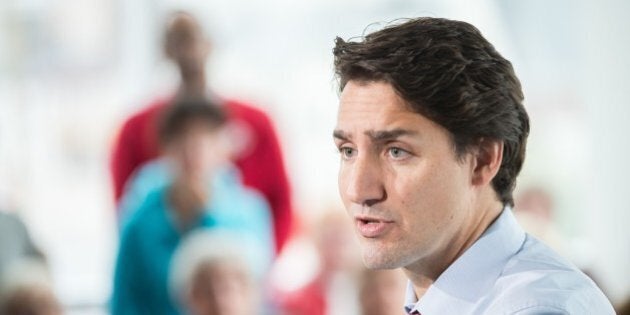 Liberal leader Justin Trudeau speaks at a rally at Goodwill Industries during a campaign stop in London, Ontario on October 7, 2015. AFP PHOTO/GEOFF ROBINS (Photo credit should read GEOFF ROBINS/AFP/Getty Images)