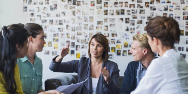 Businesswoman leading a casual meeting