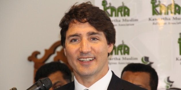 PETERBOROUGH, CANADA - JANUARY 17: Canadian Prime Minister Justin Trudeau delivers a speech during his visit at the Masjid al-Salaam, a mosque in Peterbrough that just re-opened after a fire was deliberately set, in Peterborough, Canada on January 17, 2016. (Photo by Seyit Aydoan/Anadolu Agency/Getty Images)