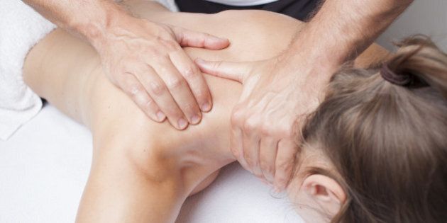 woman having a shoulder massage