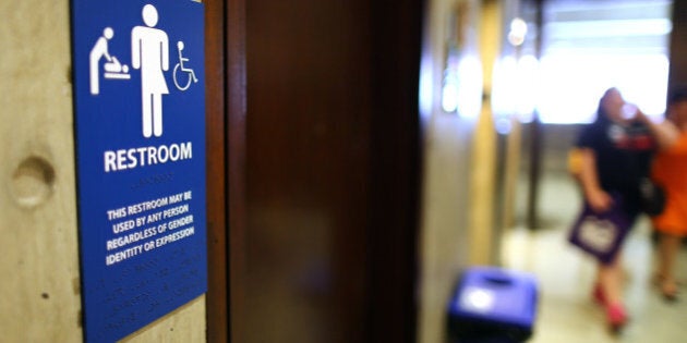 BOSTON, MA - MAY 25: The sign for the gender-neutral bathrooms on the 5th floor of Boston City Hall across from the reception area for the Mayor's office, May 15, 2016. The answer to the question of what restroom signs should say is not clear as transgender activists fight to use the facility that matches their identity. (Photo by John Tlumacki/The Boston Globe via Getty Images)