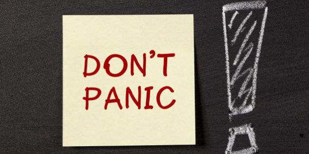 Don't Panic! note with big excalmatory mark on blackboard.