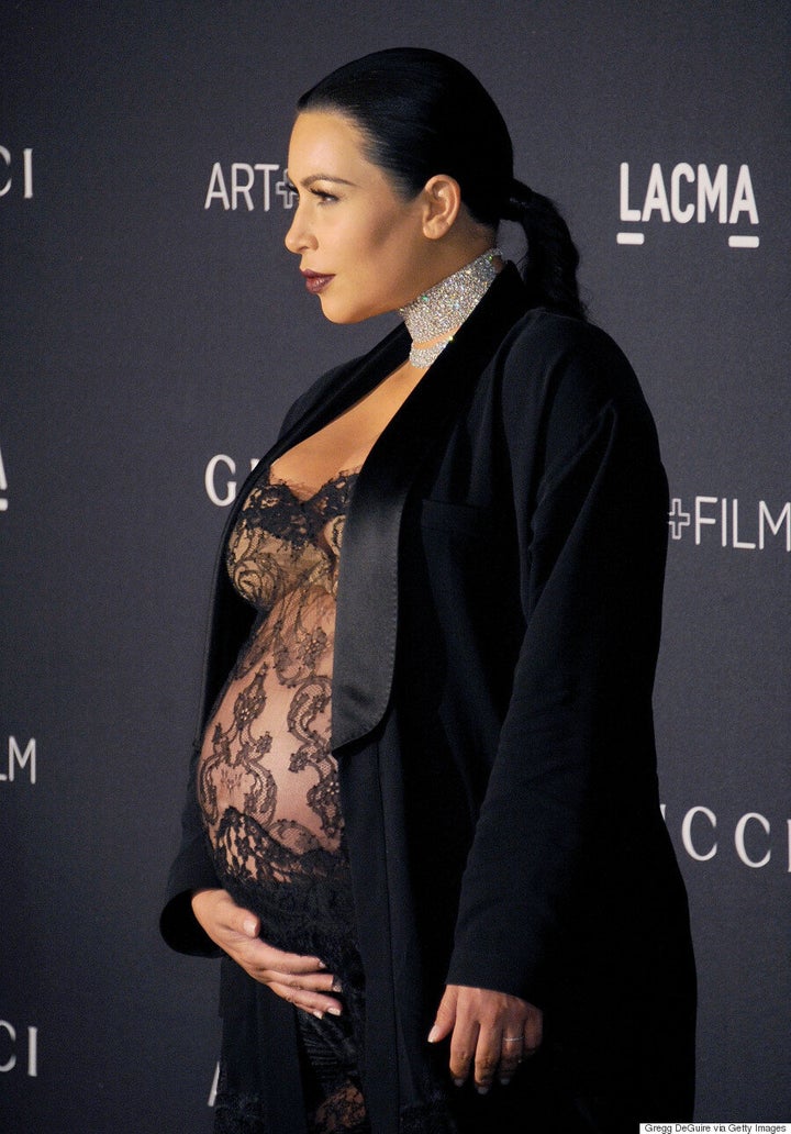 Kim Kardashian Showcases Her Very Pregnant Belly In Sheer Lacy Outfit Huffpost Style 