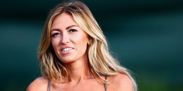 LAHAINA, HI - JANUARY 03: Paulina Gretzky watches the play of Dustin Johnson during round one of the Hyundai Tournament of Champions at the Plantation Course at Kapalua Golf Club on January 3, 2014 in Lahaina, Hawaii. (Photo by Tom Pennington/Getty Images)