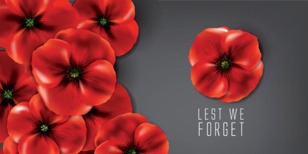 background with red poppies and a text '' lest we forget '' for remembrance day in 11 November.